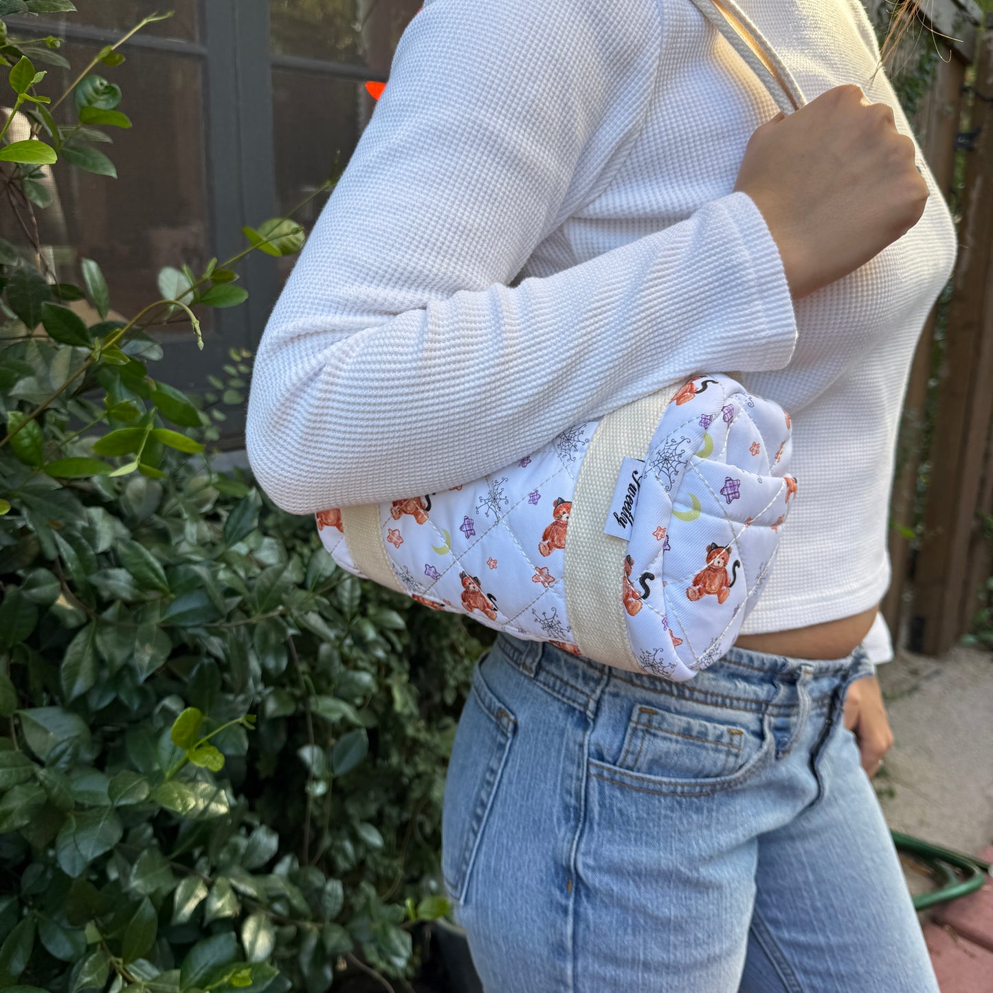 small barrel shoulder bag